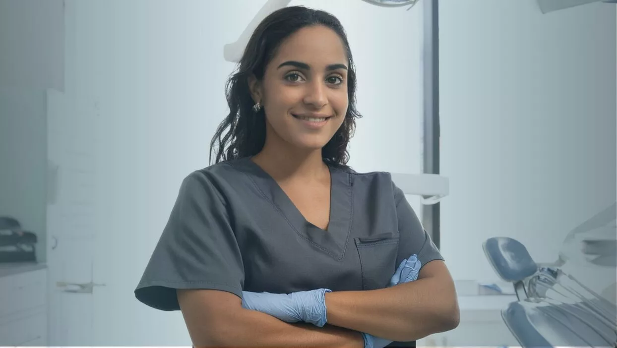 Dental Hygienist Standing in Dental Office